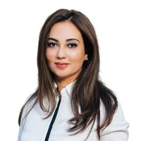 Dr. Kamila Family &amp; Cosmetic Dentistry Memorial logo