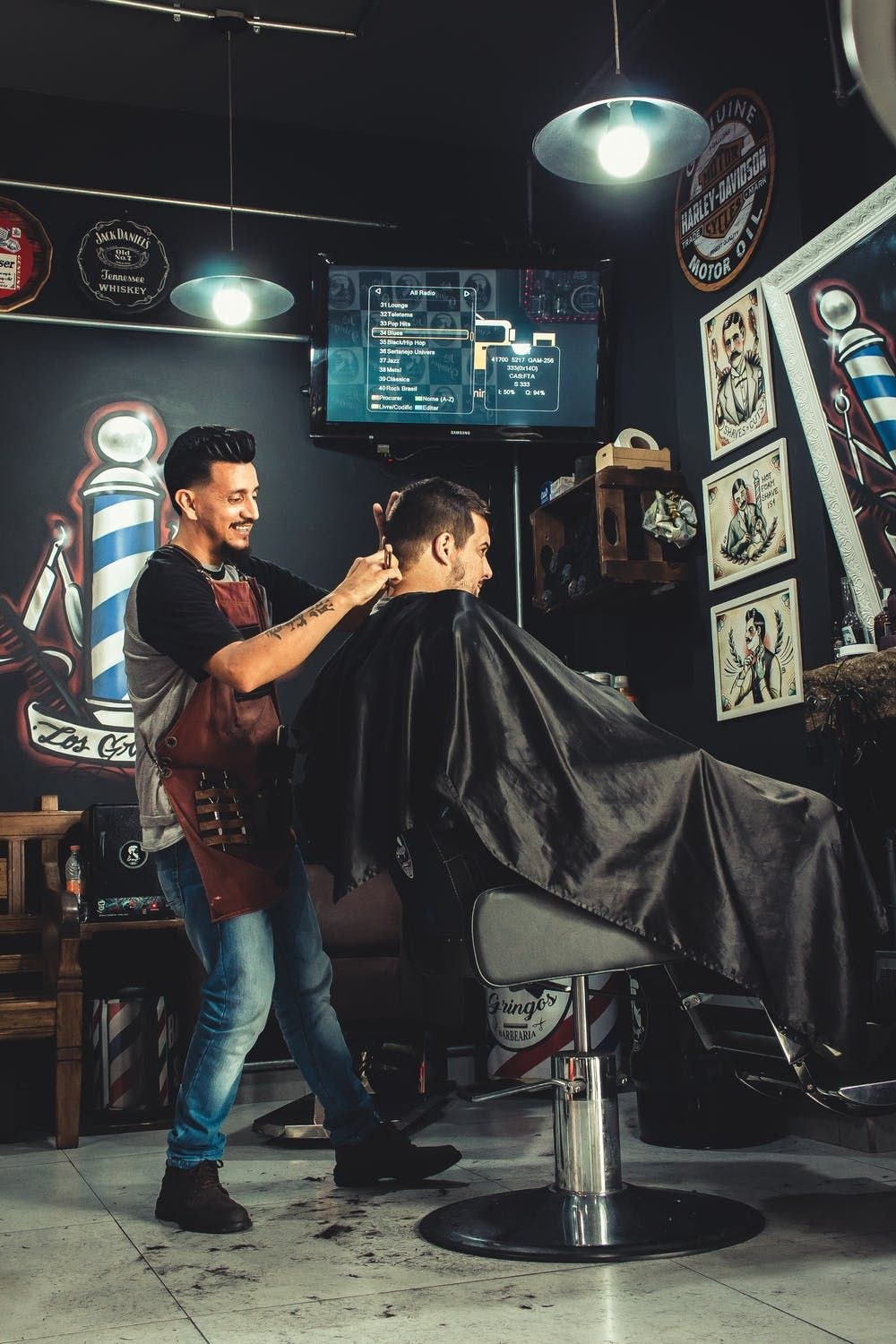 Cuttin-Up Barber Shop logo